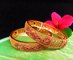 B0118_Classic Style one gram gold Plated along with pink ruby studded Bangles for Women Set of 2.