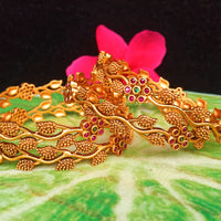 B036_Classy Gold plated bangles with flowery pattern embellished with pink and green ruby stones.