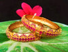 B034_Gorgeous Gold plated bangles matte finish studded with pink ruby stones.