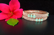 B0122_ Classy Rose Gold plated bangles studded with  American Diamond stones.