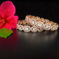 B032_S_Classy Style Rose Gold bangle studded with American Diamond stones.
