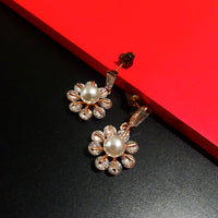 E0805_Elegant dazzling flower design rose gold american diamond stone studded earring with a touch of pearl.