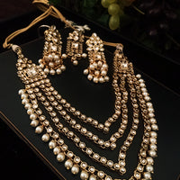 N0218_Classic Elaborated Layered choker necklace set studded with Kundan stones with a touch of glossy pearls.