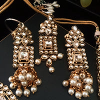 N0218_Classic Elaborated Layered choker necklace set studded with Kundan stones with a touch of glossy pearls.