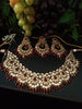N0224_Classic Elaborated Kundan choker necklace set with floral designs and with a touch of glossy maroon  beads .