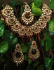 N0224_Classic Elaborated Kundan choker necklace set with floral designs and with a touch of glossy maroon  beads .