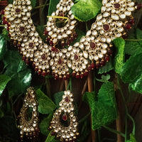 N0224_Classic Elaborated Kundan choker necklace set with floral designs and with a touch of glossy maroon  beads .