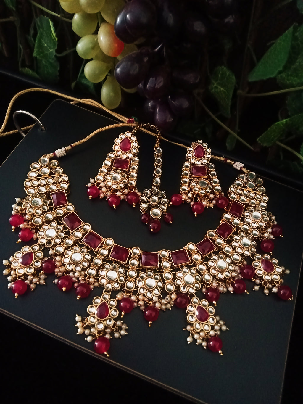N0221_Classic Elaborated choker necklace set studded with Kundan stones and over sized red color square shaped stones with a touch of glossy red beads and pearls.