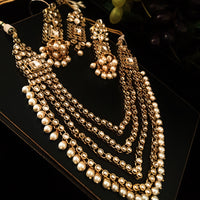 N0218_Classic Elaborated Layered choker necklace set studded with Kundan stones with a touch of glossy pearls.