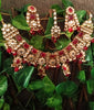 N0221_Classic Elaborated choker necklace set studded with Kundan stones and over sized red color square shaped stones with a touch of glossy red beads and pearls.