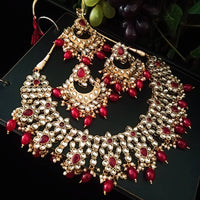 N0222_Classic Elaborated Kundan choker necklace set with floral designs and with a touch of glossy red beads .