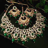 N0220_Classic Elaborated choker necklace set studded with Kundan stones with a touch of glossy green beads.