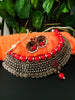 N0230_Grand German Silver Oxidized choker necklace set with delicate craft work pattern studded with red stones with a touch of red glossy beads.