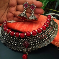 N0230_Grand German Silver Oxidized choker necklace set with delicate craft work pattern studded with red stones with a touch of red glossy beads.