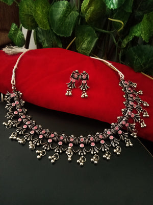 N0225_Classic German Silver Oxidized choker necklace set with delicate work of floral pattern studded with beautiful pink stones with a touch of beads.
