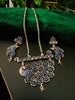 N0235_Classy German Silver Oxidized necklace set with delicate craft work peacock design shaped pendant studded with blue stones with a touch of beads.