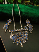 N0235_Classy German Silver Oxidized necklace set with delicate craft work peacock design shaped pendant studded with blue stones with a touch of beads.