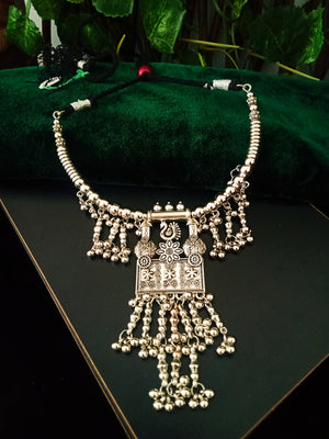 N0234_Classy Matte Silver Oxidized necklace set with delicate craft work of floral & peacock pattern square shaped pendant with a touch of beads.