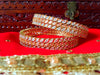 B013_Classy Style Gold Plated Bangles studded  with American Diamond stones.