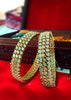 B013_Classy Style Gold Plated Bangles studded  with American Diamond stones.