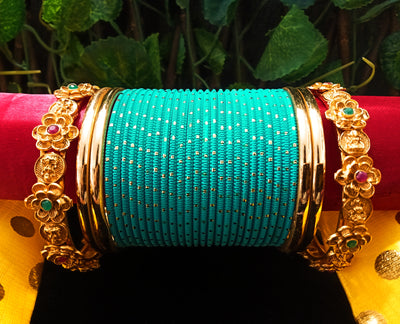 B0125_Exquisite bangle set with Colorful metal bangles along with Matte Gold plated bangles with touch of ruby stones.