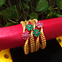 B0129_Exquisite Matte gold plated bangles set with a touch of stones with delicate flower design.