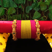 B0131_Exquisite bangles set with colorful metal bangles along with Matte gold plated bangles with delicate flower design.