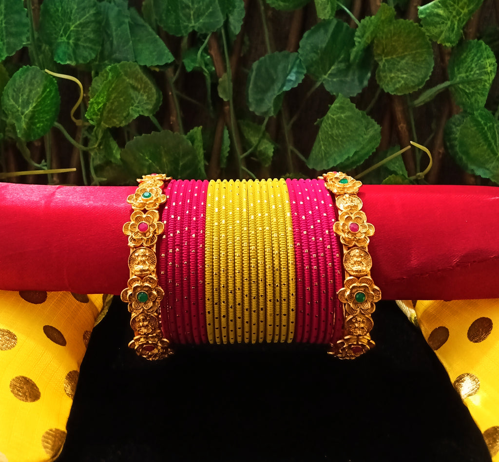B0131_Exquisite bangles set with colorful metal bangles along with Matte gold plated bangles with delicate flower design.