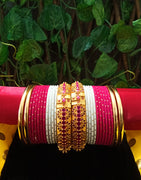 B0136_Gorgeous bangles set with Matte gold plated plain bangles and Grand delicate work bangles with a touch of stones.