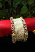 B0137_Gorgeous bangles set with metal bangles along with American Diamond studded bangles with delicate work.