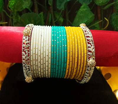 B0138_Gorgeous bangles set with Colorful metal bangles along with American Diamond studded bangles with delicate work.