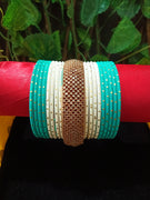 B0141_Gorgeous bangles set with Colorful metal bangles along with American Diamond studded bangles with delicate work.