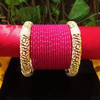 B0142_Gorgeous bangles set with Colorful metal bangles along with American Diamond studded Gold plated bangles with delicate work.