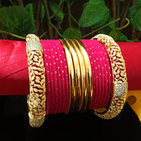 B0142_Gorgeous bangles set with Colorful metal bangles along with American Diamond studded Gold plated bangles with delicate work.