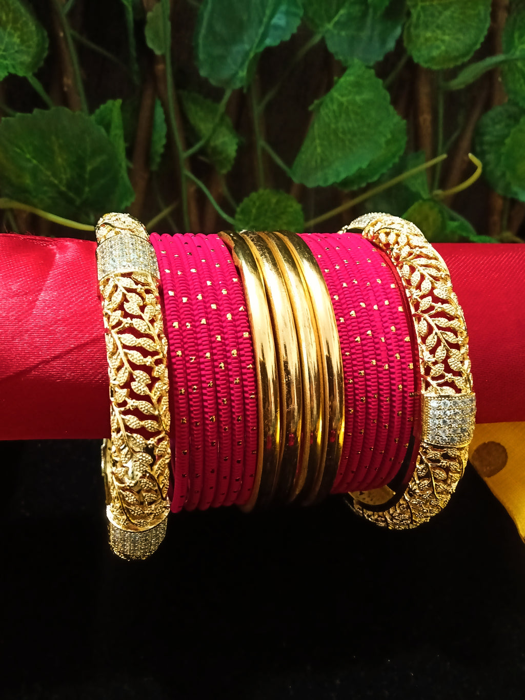 B0142_Gorgeous bangles set with Colorful metal bangles along with American Diamond studded Gold plated bangles with delicate work.