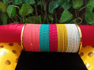 B0143_Gorgeous bangles set with Multi color metal bangles along with Gold plated bangles.