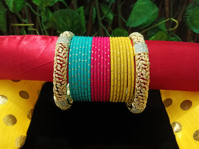 B0144_Gorgeous bangles set with Multi color metal bangles along with Gold plated American Diamond bangles.
