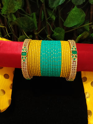 B0145_Gorgeous bangles set with Multi color metal bangles along with Gold plated American Diamond bangles.