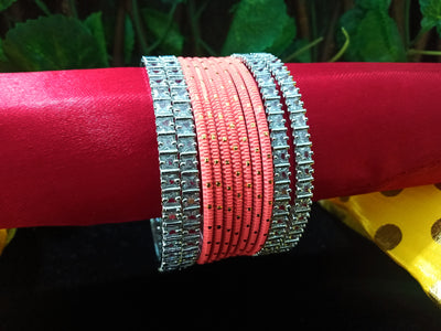 B0147_Gorgeous bangles set with colorful metal bangles along with American Diamond bangles.