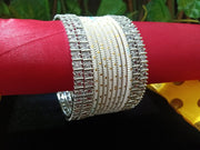 B0148_Exquisite bangles set with colorful metal bangles along with American Diamond bangles.