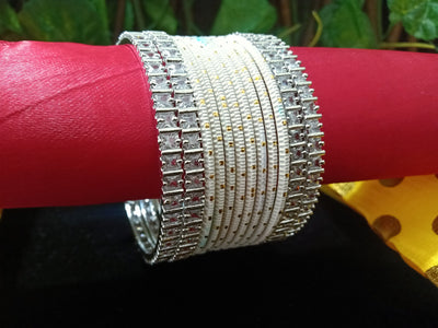 B0148_Exquisite bangles set with colorful metal bangles along with American Diamond bangles.