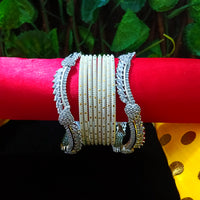 B0149_Exquisite bangles set with colorful metal bangles along with American Diamond bangles.