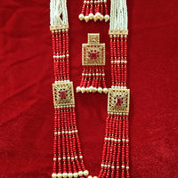 N0126_Classy Style Stunning Long Multilayered ‘Raani Haar’ Necklace set with off white pearls and red color crystal drops studded with American Diamond stones.