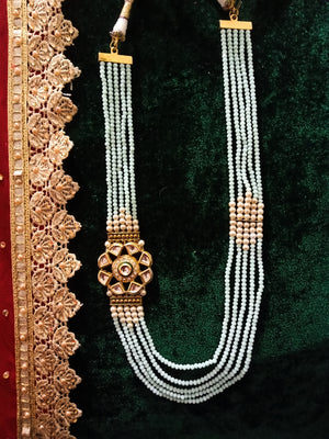 N0250_Gorgeous sky blue color layered Crystal necklace set studded with semi precious stones with a side pendant with a touch of pearls.