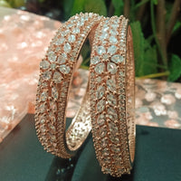 B0152_S_ Exquisite Rose Gold plated bangles with delicate art work studded with  American Diamond stones.