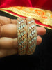 B0157_Elegant design Rose gold bangle studded with American Diamond stones.