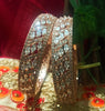 B0157_Elegant design Rose gold bangle studded with American Diamond stones.