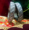 B0158_Elegant design silver crafted bangle studded with American Diamond stones.
