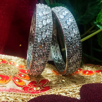 B0158_Elegant design silver crafted bangle studded with American Diamond stones.