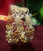 B0161_Gorgeous crafted bangles with floral design studded with American Diamond stones.
